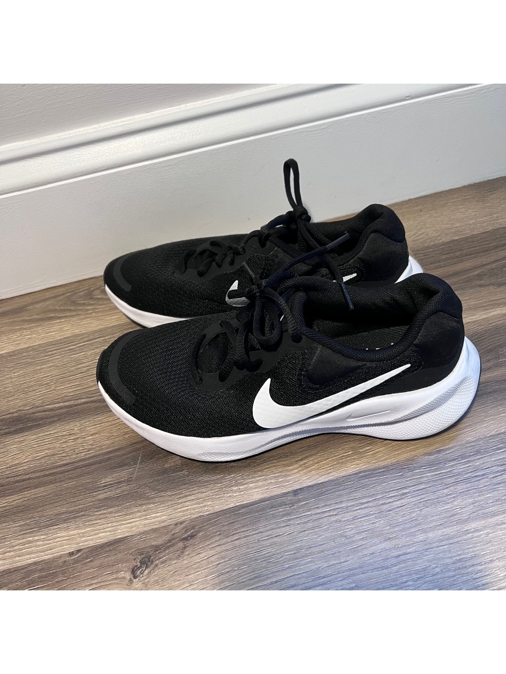 Nike running shoes black and white, women's size 6